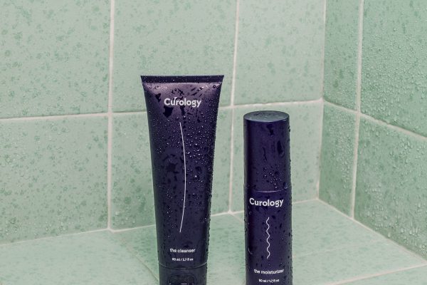 Luxury skincare products arranged on marble surface